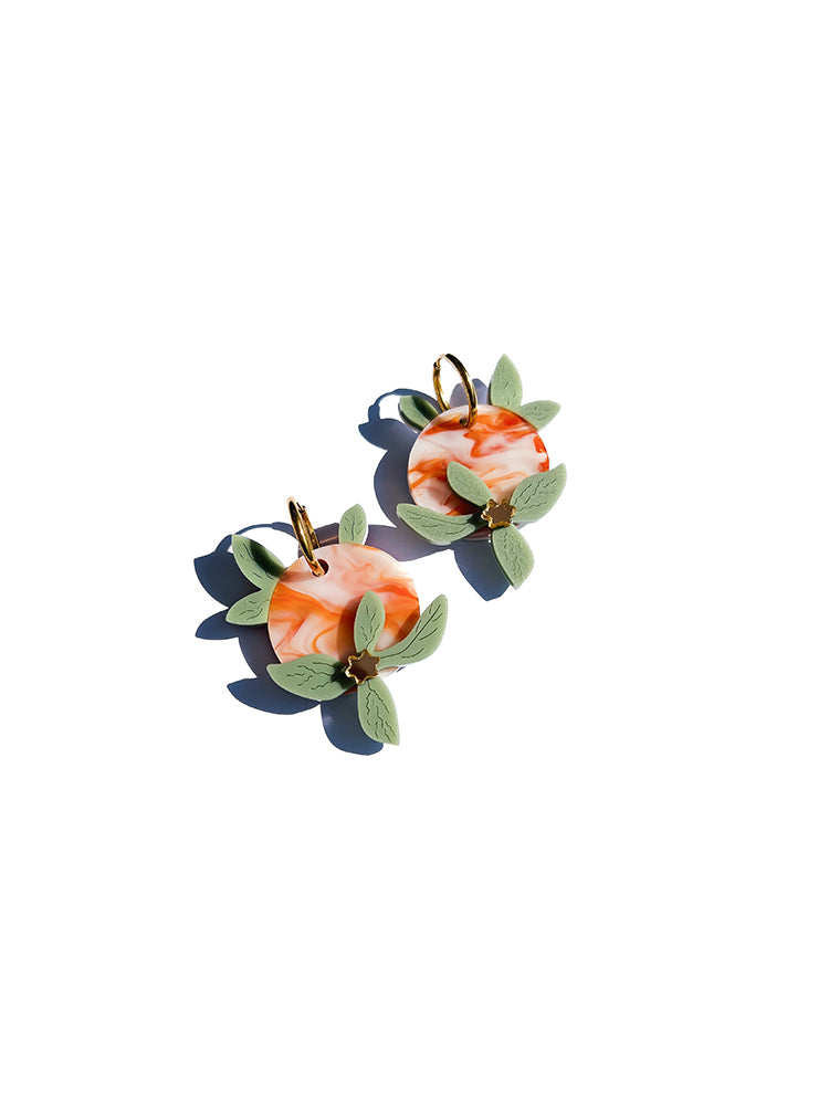 Citrus Garden | Crazy Quilt - A vibrant statement piece, these handmade earrings offer a fresh, citrus-inspired twist on classic hoops - top view