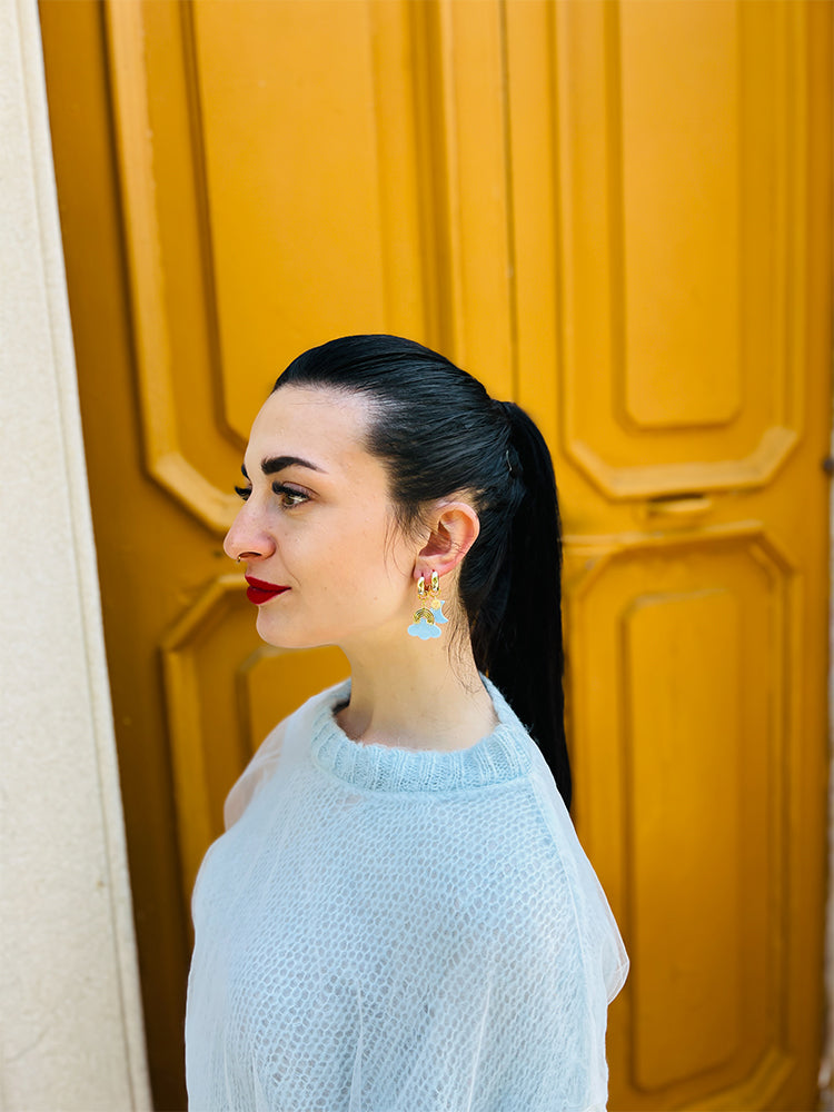 Whimsical and light, the Clouds in the Sky | Stacker Hoop Set features handmade mini drop earrings with a beautiful sky-inspired design - photo model - Italy