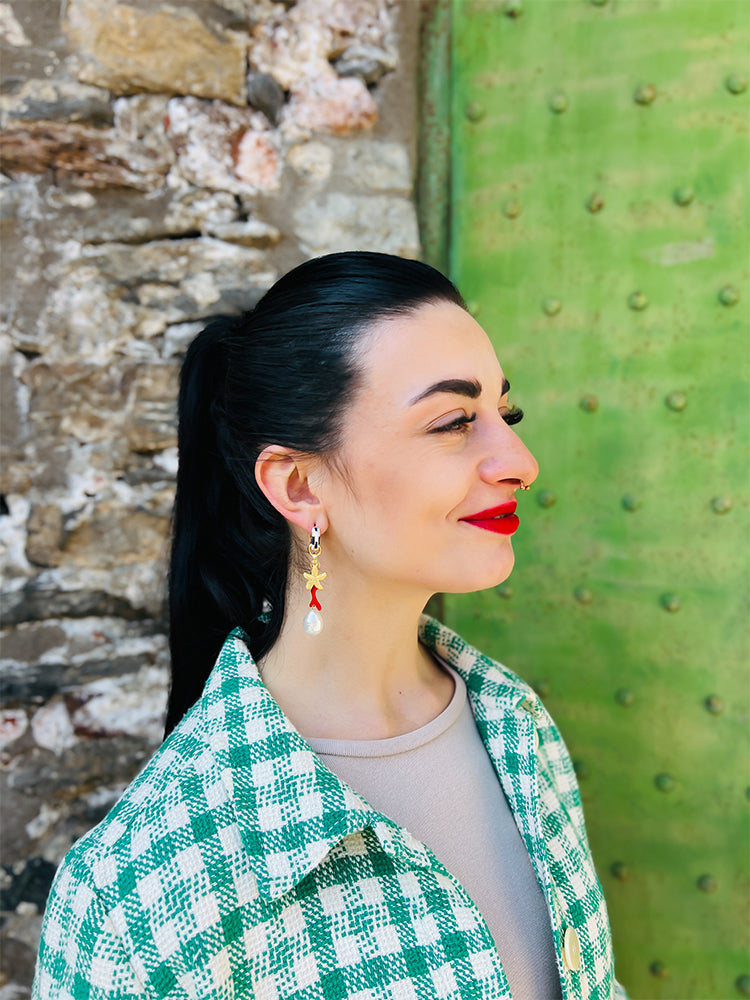 Starfish Reef | Huggie Hoop earrings: stunning handmade earrings with a pearl drop and vibrant colour, perfect for jewellery lovers seeking unique, imperfectly perfect pieces inspired by the sea - photo model - Italy 
