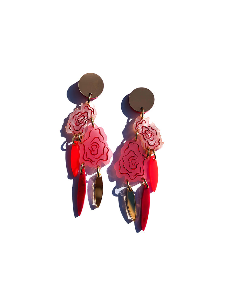 Romantic handmade earrings inspired by roses , from side