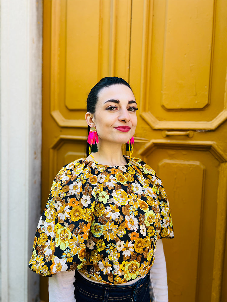 Daisy Daze - handmade earrings, featuring pink tassels for a dynamic and fashionable flair - photo model - Italy 