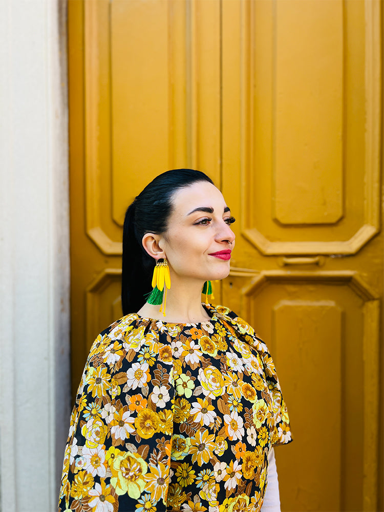 Daisy Daze | Yellow – Handmade earrings with a playful tasselled design perfect for any occasion - photo model - Italy