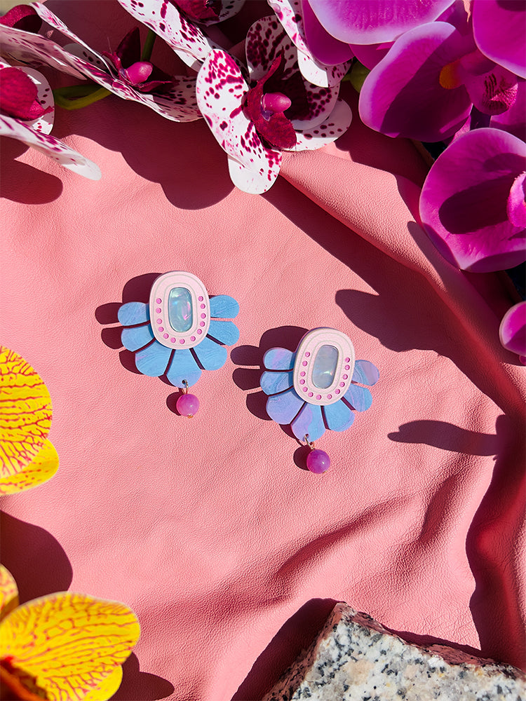 Marble Fan, Ancient Dreams, and Bubble Swirl designs – handmade Concrete Jellyfish earrings, offering a refined, fluid style - styled shot