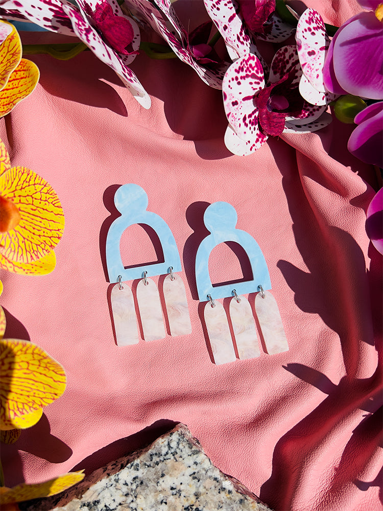 Pompei | Statement | Sky Blue White – Elegant earrings in blue tones, inspired by the natural beauty of the open landscape - styled shot