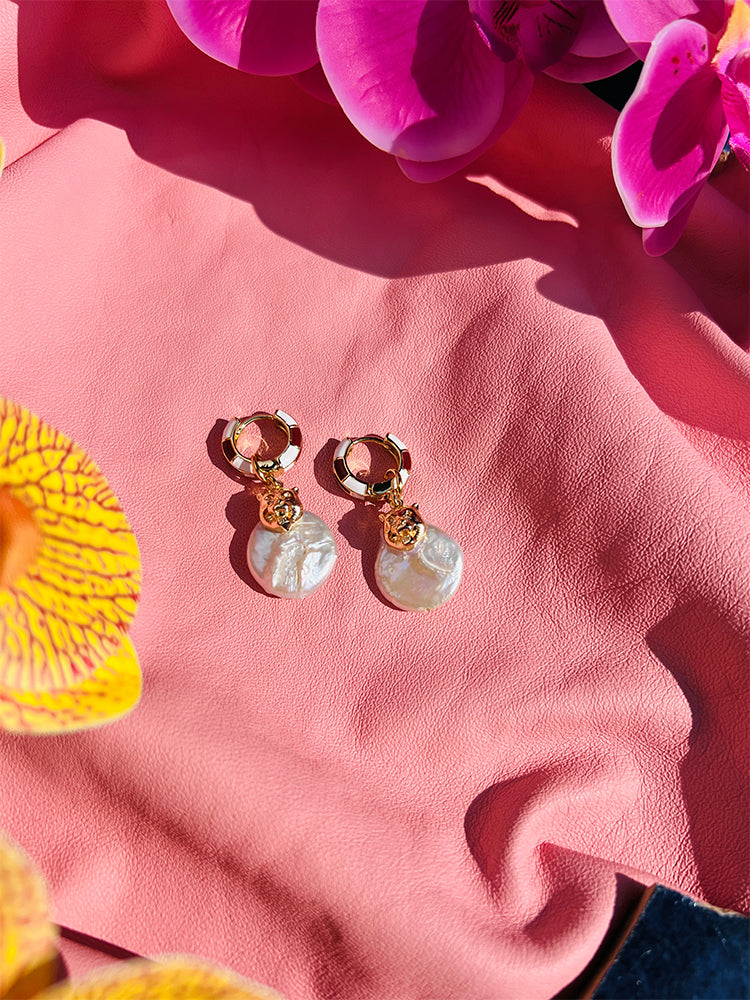 Puma Pearl | Huggie Hoop Earrings, combining the strength of a puma and the elegance of an irregular pearl, a stunning choice for a wedding day accessory - styled shot