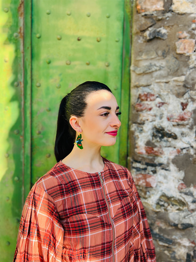 Red Winged Parrot hoops, merging vibrant accents with timeless handmade craftsmanship for a unique touch - photo. model - Liguria , Italy 