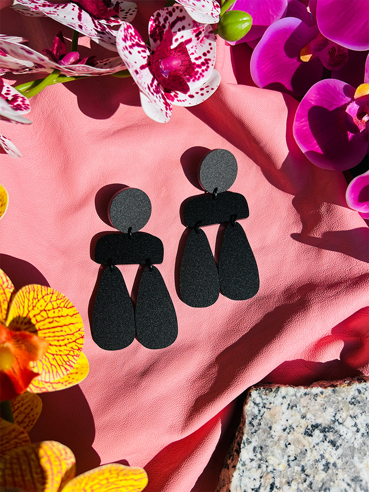Sophia | Statement Abstract | Matte Black earrings: elegant handmade earrings with a contemporary matte black design, perfect for adding sophistication and boldness to your jewellery collection - styled shot 