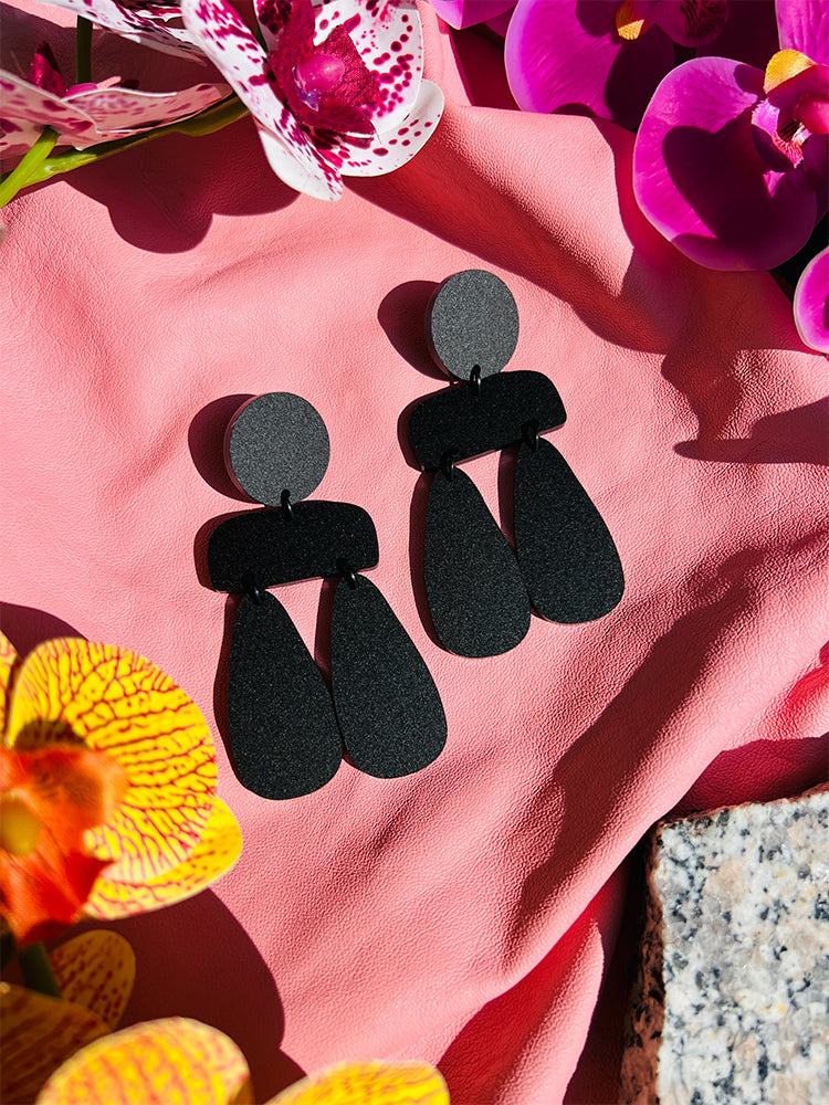 Handmade Sophia | Statement Abstract | Matte Black earrings: sleek earrings with matte black tones and abstract details, ideal for those who appreciate bold, elegant handmade jewellery - styled shot 