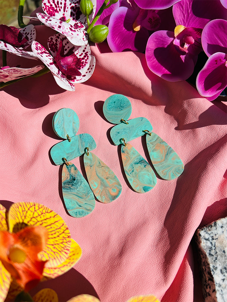 Sophia | Statement Abstract | Turquoise Marble earrings: eye-catching handmade earrings featuring striking turquoise marble details and bold abstract design, perfect for creative jewellery lovers - styled shot 