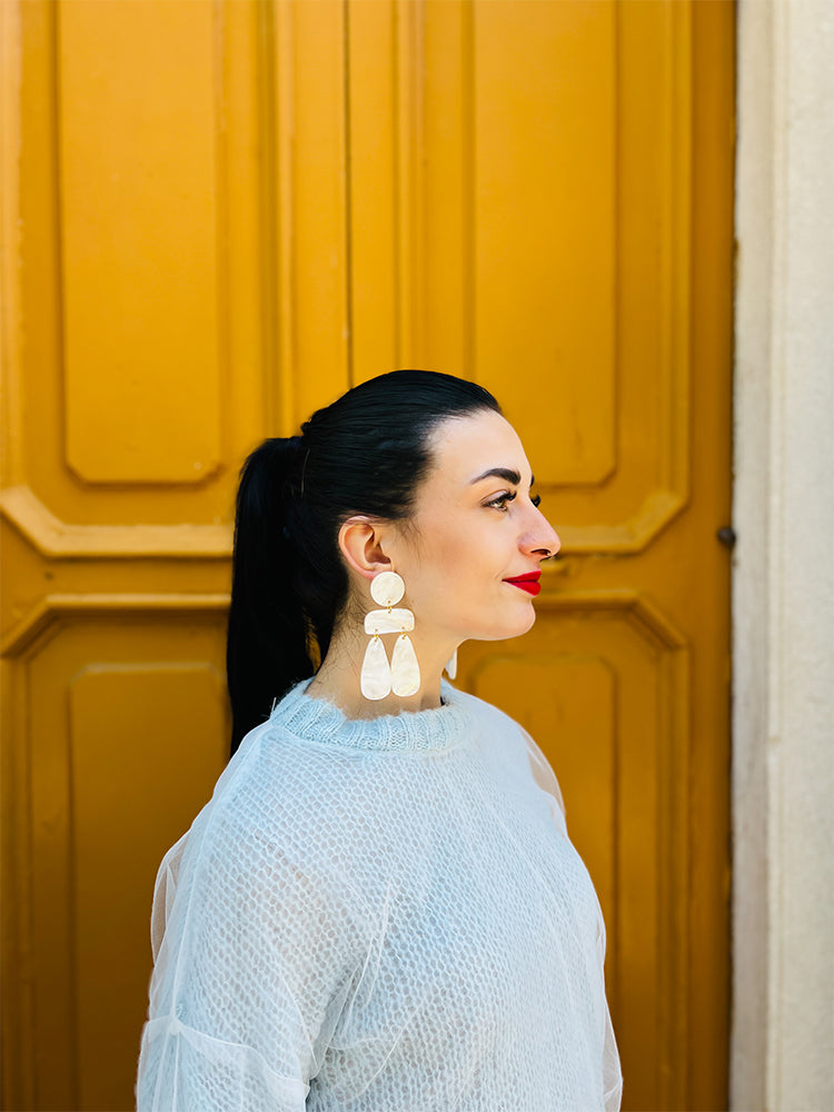 Handmade Sophia | Statement Abstract | White Marble earrings: striking statement earrings with abstract design and white marble detail, perfect for adding a touch of sophistication to any outfit - photo model - Italy 