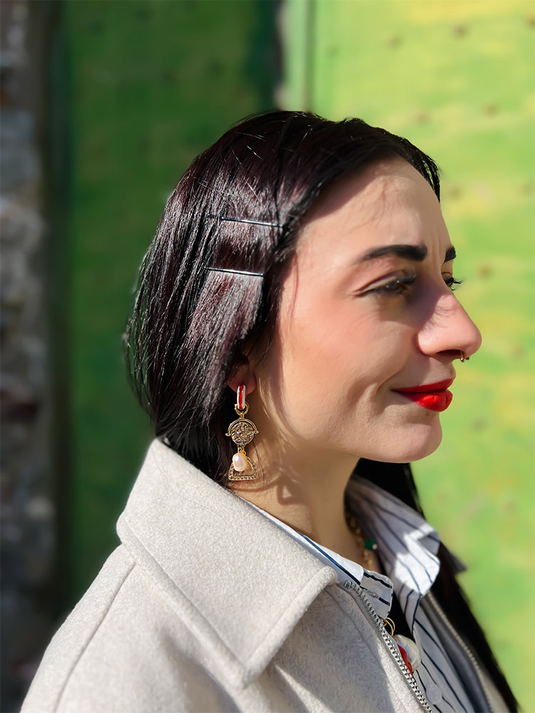 The Stirrup Pearl Hoop – a perfect pair of handmade earrings for special occasions or everyday elegance - photo model